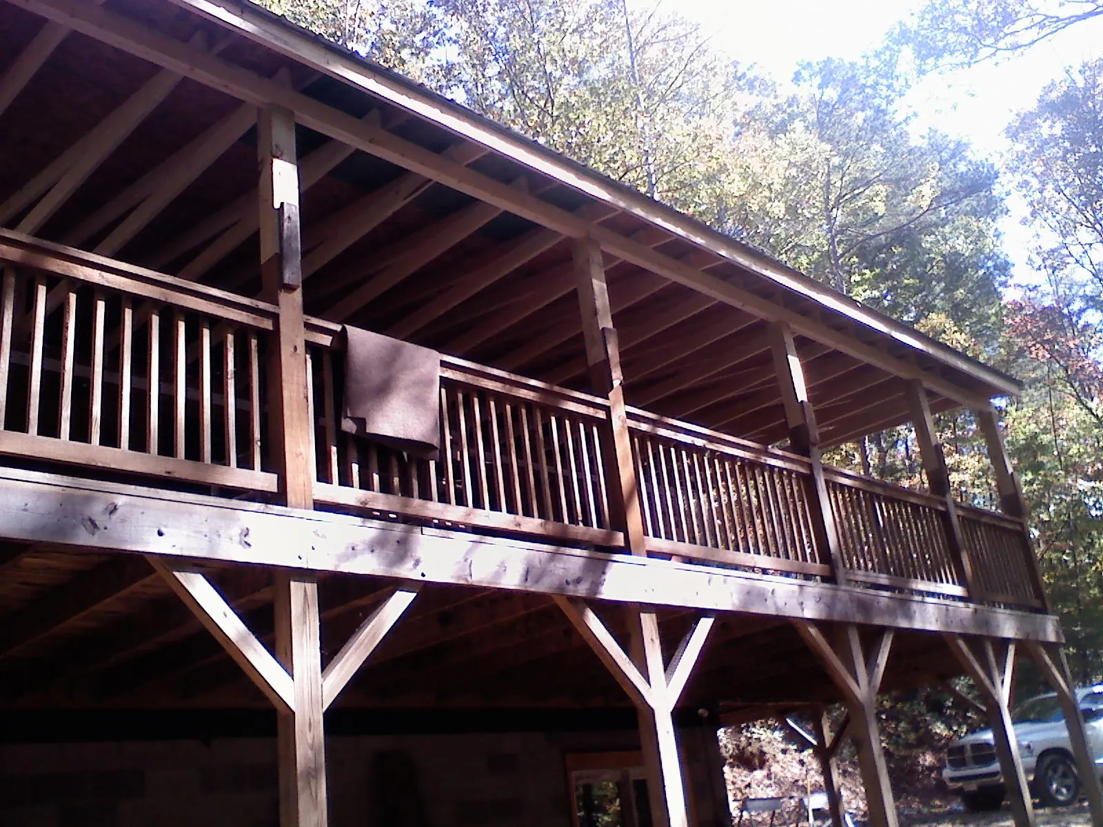 Timber framing under a new elevated porch and deck — Roof Leak Repair in Opolis by Roofing Brothers